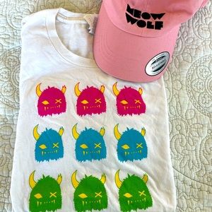 Meow wolf shirt and hat